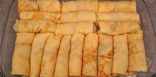 Фото приготовления рецепта: Блинчики с грибами, запечённые со сливочным соусом и сыром - шаг №30