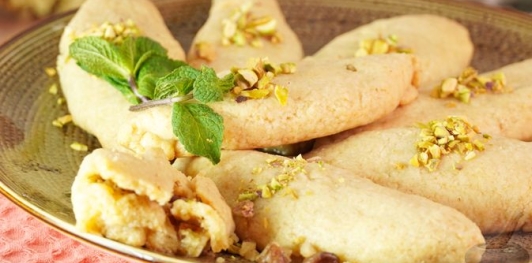 Фото приготовления рецепта: Калбурабасты (турецкое печенье с ореховой начинкой) - шаг №19