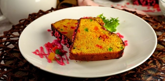 Фото приготовления рецепта: Морковно-апельсиновый кекс с цукатами - шаг №28