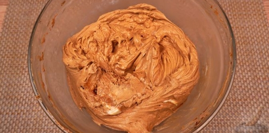 Фото приготовления рецепта: Ореховый торт с кофейным кремом - шаг №21