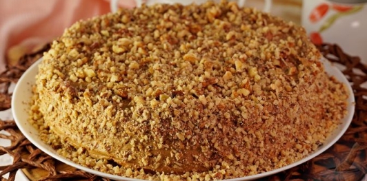 Фото приготовления рецепта: Ореховый торт с кофейным кремом - шаг №24