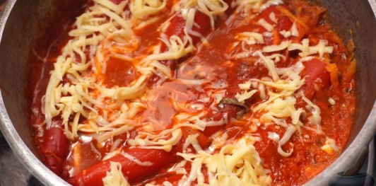 Фото приготовления рецепта: Перец, фаршированный мясом, помидорами и сыром (без риса) - шаг №15