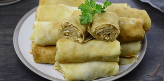 Фото приготовления рецепта: Блинчики с курицей и капустой - шаг №31