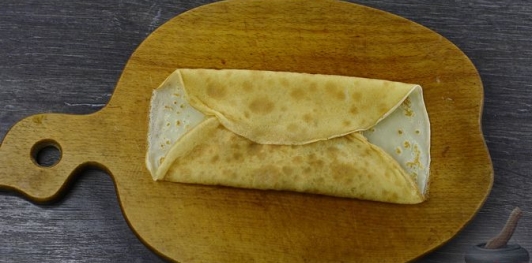 Фото приготовления рецепта: Блинчики с курицей и капустой - шаг №27