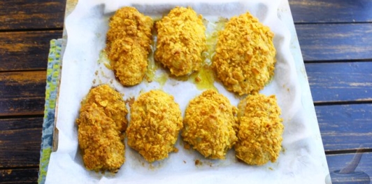 Фото приготовления рецепта: Куриные наггетсы в духовке - шаг №19