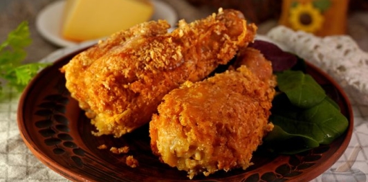 Фото приготовления рецепта: Куриные ножки в сырной панировке - шаг №15