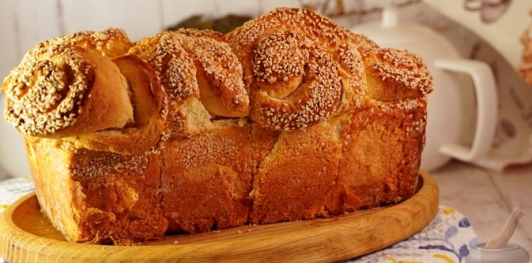 Фото приготовления рецепта: Миндальные булочки с апельсиновой цедрой и кунжутом - шаг №31