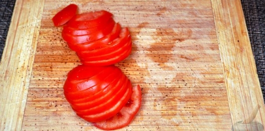 Фото приготовления рецепта: Сибас, запечённый на овощной подушке - шаг №3