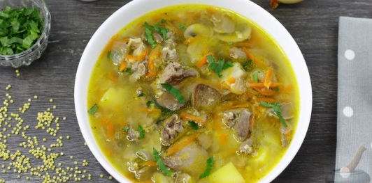 Фото приготовления рецепта: Суп с куриными потрошками, грибами и пшеном - шаг №30