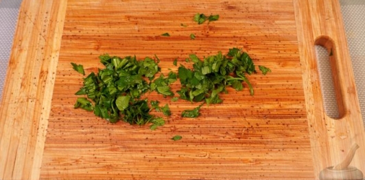 Фото приготовления рецепта: Артишоки, запечённые с сыром и сливками - шаг №7