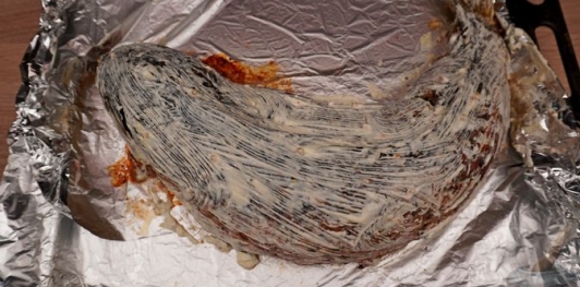 Фото приготовления рецепта: Карп, фаршированный грибами (в духовке) - шаг №23