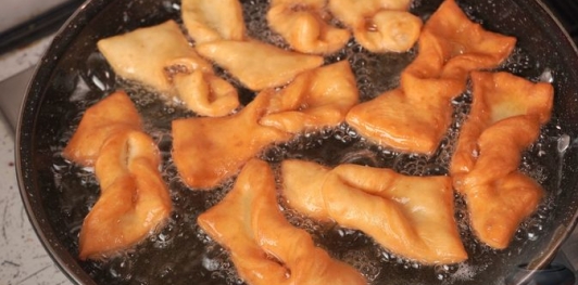 Фото приготовления рецепта: Печенье "Крылья ангела" (на кефире) - шаг №11