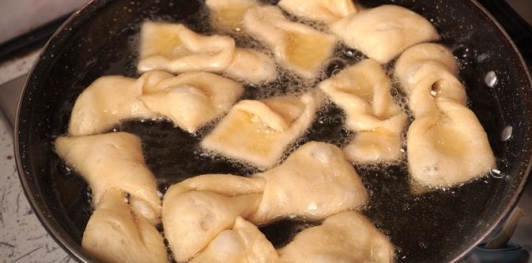 Фото приготовления рецепта: Печенье "Крылья ангела" (на кефире) - шаг №10