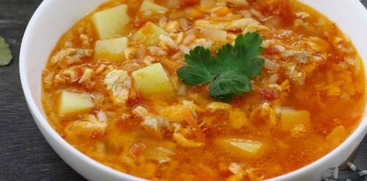 Фото приготовления рецепта: Рыбный суп с рисом и сельдереем - шаг №20